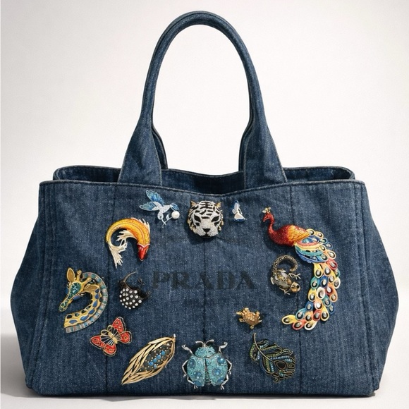 Prada Handbags - Prada Denim Canapa pre-owned tote embellished w/13 exotic animal brooches, L